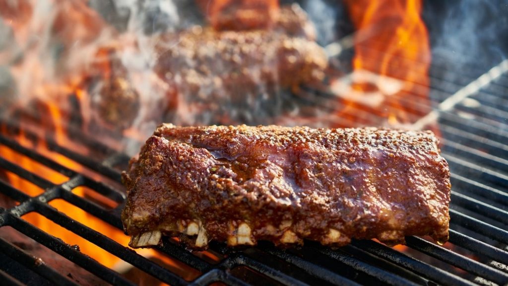 Smoking the brisket over a grill