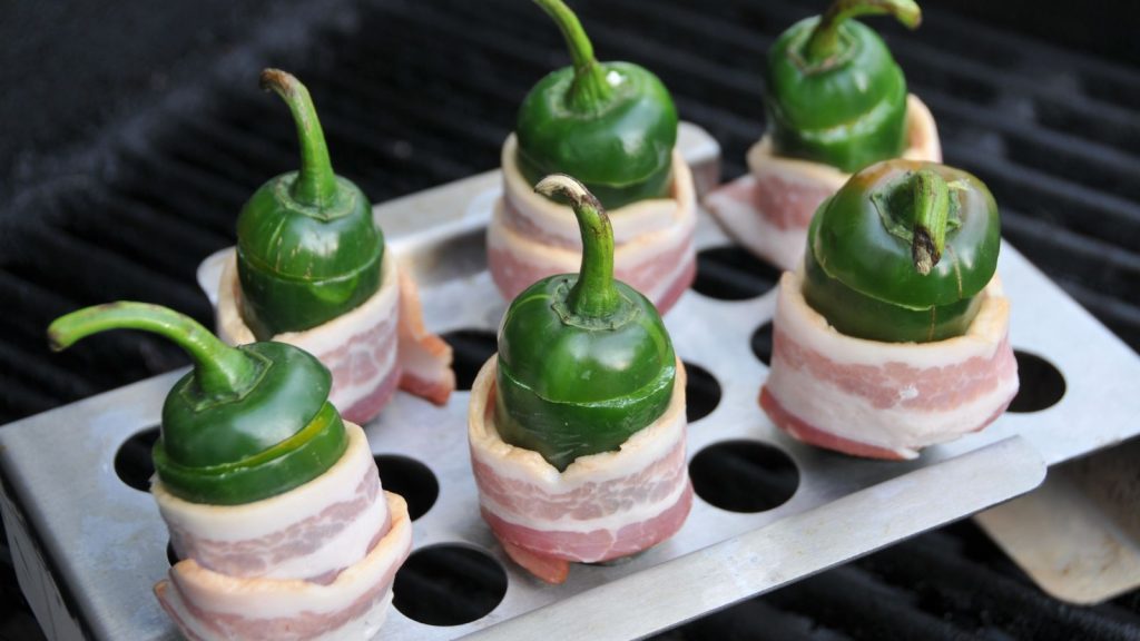 Jalapenos wrapped with bacon strips