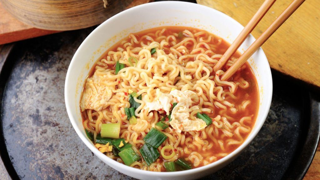 A bowl of Ramen with chopsticks