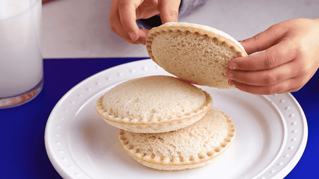 Human hands holding Uncrustable